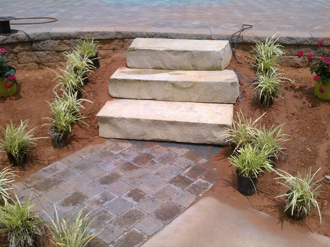 ​Landscape Solutions & Design offers custom enhancements to transform your yard or business. They create custom hardscapes to enhance your property.
